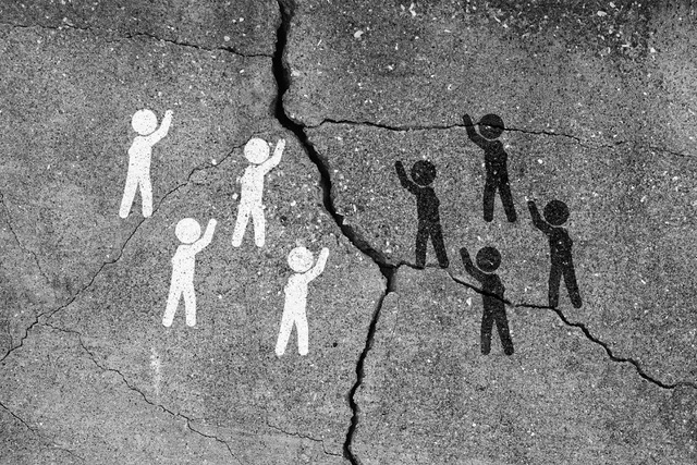 black and white stick figures depicting racism